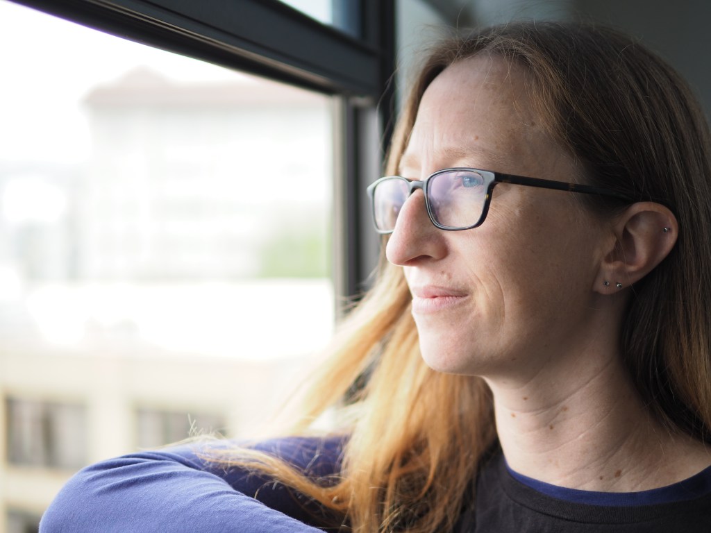 The author looking out a window